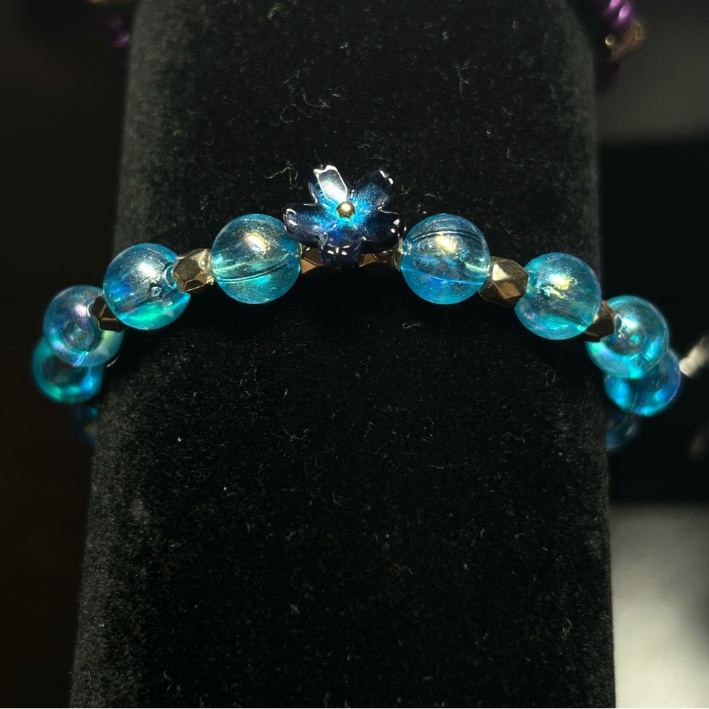 Gold and Blue Beaded Bracelet with Floral Accent
